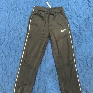 Nike Kids Black Joggers with White Swoosh